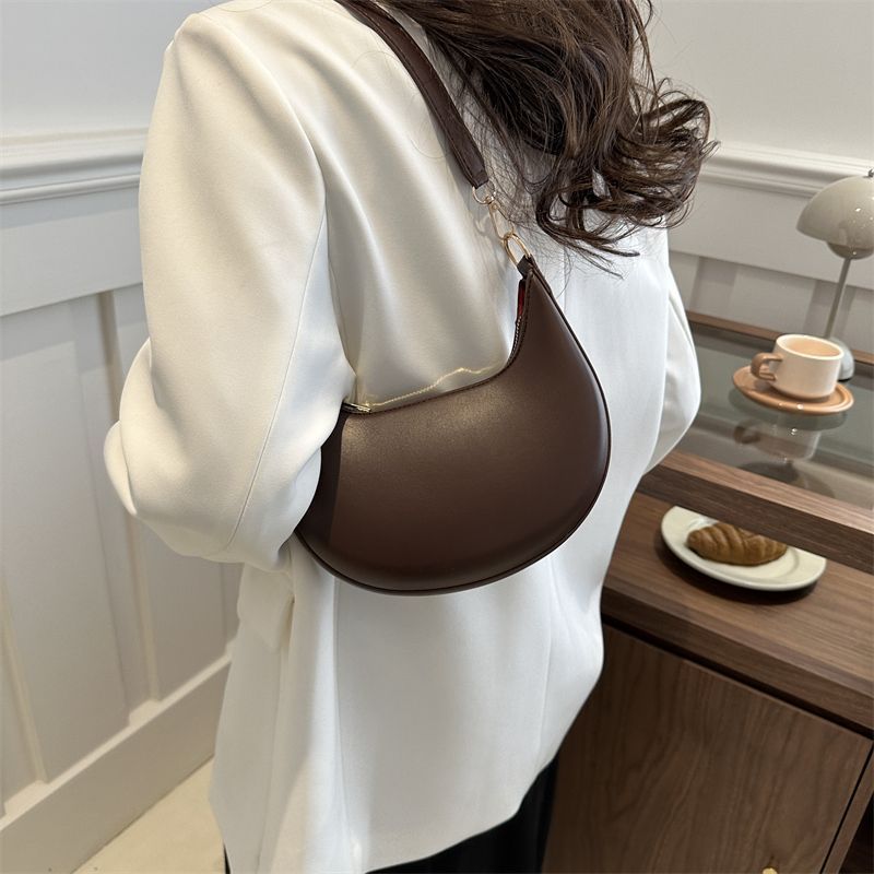 The Noura - Crescent Textured Shoulder Bag