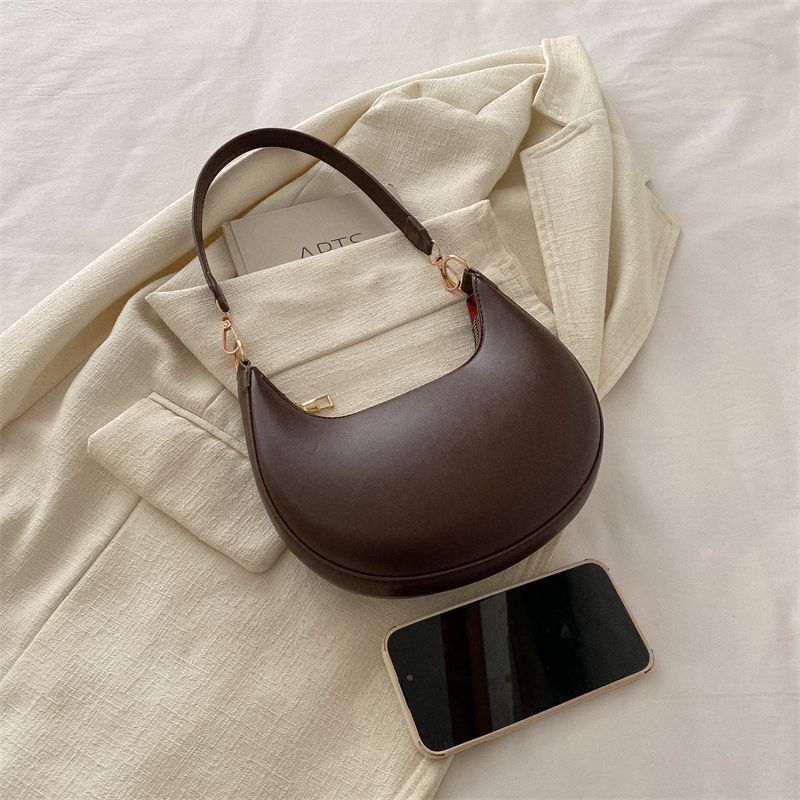 The Noura - Crescent Textured Shoulder Bag