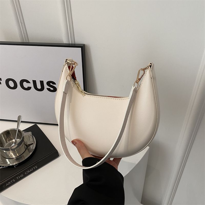The Noura - Crescent Textured Shoulder Bag