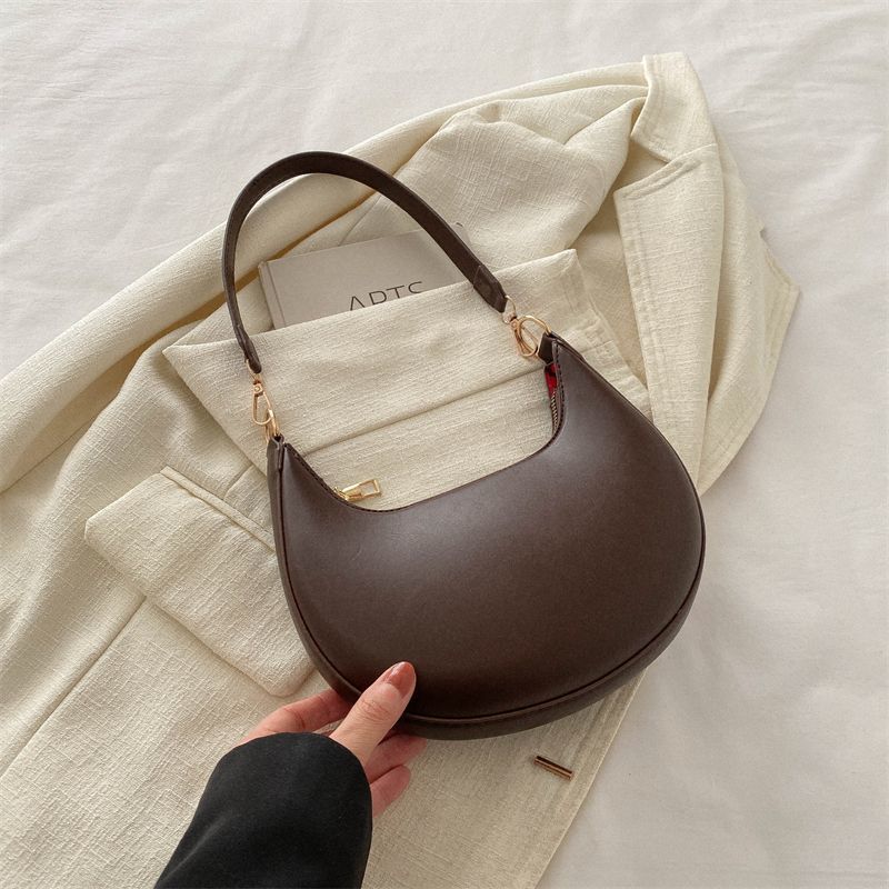 The Noura - Crescent Textured Shoulder Bag
